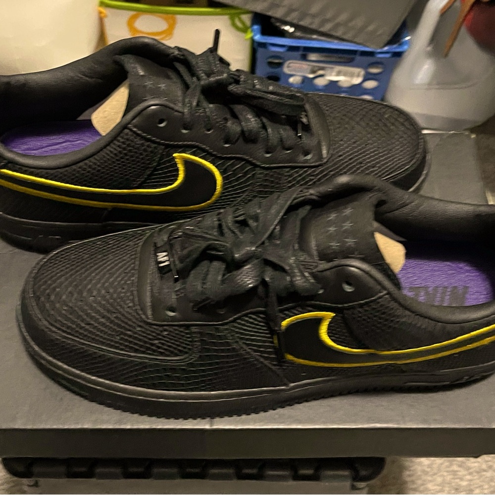 Black Sneakers with Yellow Accents